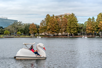 ORLANDO, FLORIDA, USA - DECEMBER, 2018: Eola Lake Park, popular destination for festivals, concerts, fundraising walks and even weddings.