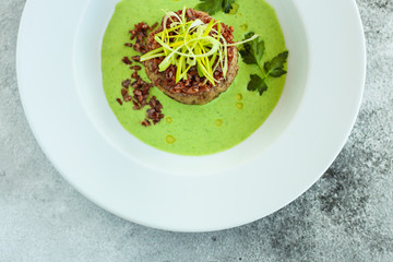 Wild rice with meat ball roasting and green sauce (main dish, portion). food background. copy space
