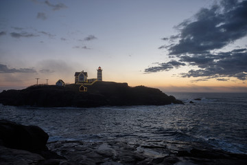 Early dawn at the Nubble Lighthouse off the Maine Coast