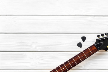 Music record studio with musician and DJ instruments white wooden background top view copyspace