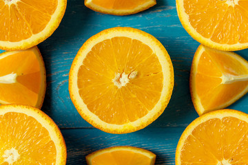fresh oranges, top view. Healthy citrus fruits on blue wooden background, top view, copyspace.