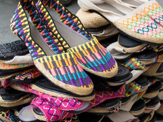 Street sell of traditional espadrilles at Cali city center
