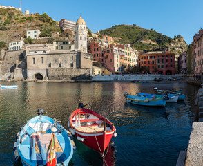 Small port with color fishing boats at Vernazza town, Cinque Terre, Italy