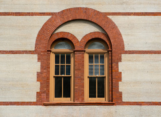 Windows with a brick archway architectural look
