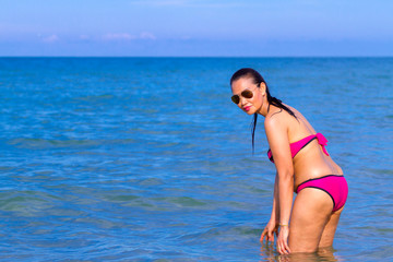 Woman and bikini pink show body pretty on beach