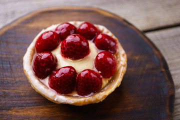 dessert background. delicious raspberry vanilla cream cheese  berry tart. sweet treat, confectionery, traditional recipe