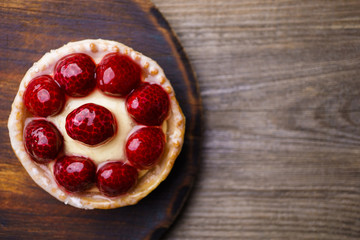 dessert background. delicious raspberry vanilla cream cheese  berry tart. sweet treat, confectionery, traditional recipe
