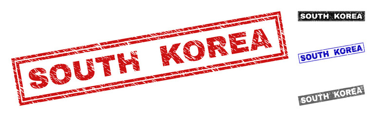Grunge SOUTH KOREA rectangle watermarks isolated on a white background. Rectangular seals with grunge texture in red, blue, black and gray colors.