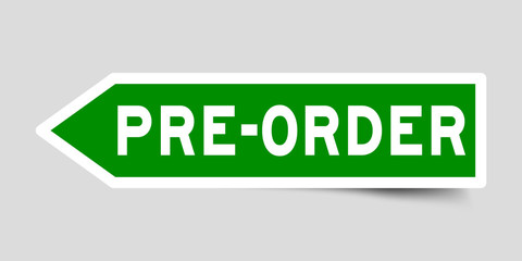 Arrow shape green color sticker in word pre order on gray background