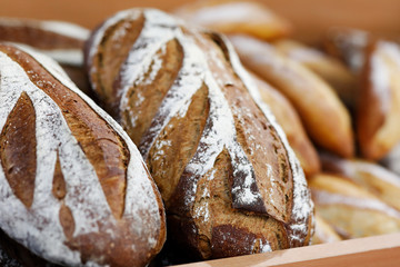 artisanal bread on the wooden shelf in the bakery