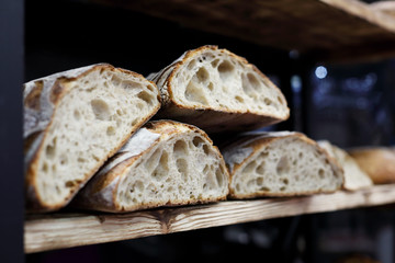 artisan sourdough bread on the wooden shelf