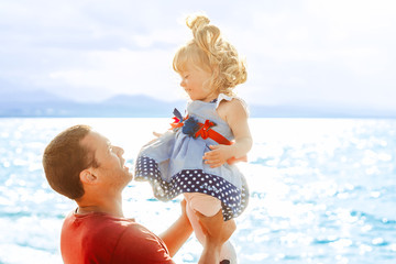 dad picks up the child