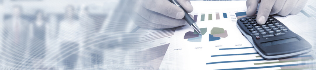 Hand with pen writing