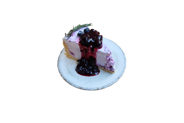 Blueberry cheesecake on plate with fresh blueberries isolated on white background,delicious dessert.