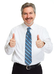 Happy businessman with thumbs