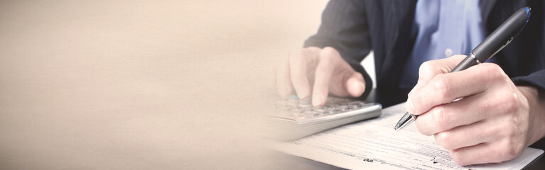 Accountant hands with calculator