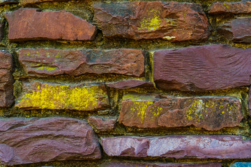 Old red brick and stone wall cement texture