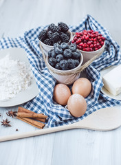 Baking berry cake in kitchen.