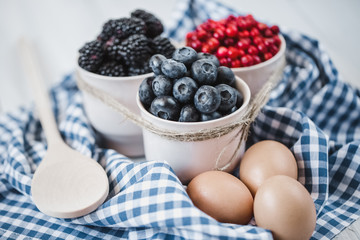 Baking berry cake in kitchen.