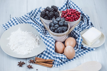 Baking berry cake in kitchen.