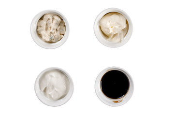 Set of different sauces on white background. Top view.