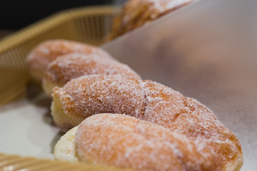 Freshly baked boulangerie from a japanese shop, covered with sugar.