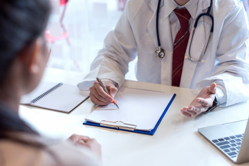 Male doctor advised against patient woman about women cancer. Diagnostic, prevention of women diseases, healthcare, medical service, consultation, healthy lifestyle concept.