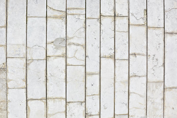 horizontal texture of gray tiles on the wall