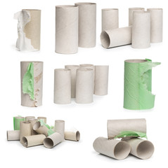 A selection of cardboard toilet paper tubes in various arrangements isolated on a white background