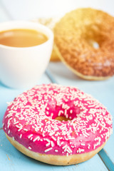 Sweet donuts on black stone table