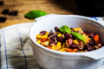 Chili corn carne on wood table