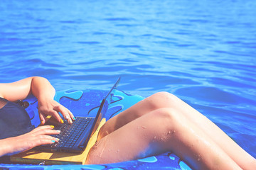 Beautiful young woman in the sea.