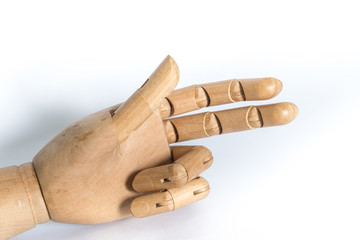 Wooden hand on a white background. With copyspace.