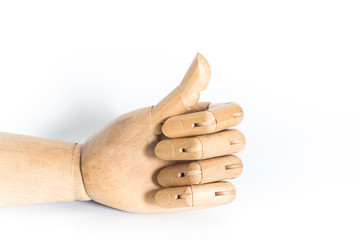 Wooden hand on a white background. With copyspace.