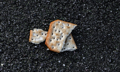 Broken cracker on the road