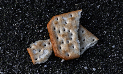Broken cracker on the road