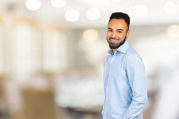 Obraz premium Handsome cheerful african american executive business man