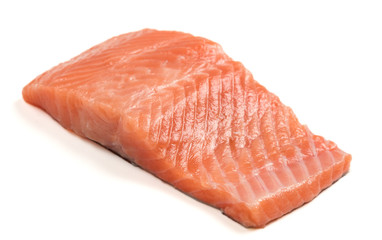 Raw salmon fillet on a white background. Trout fillet with rosemary. Wild atlantic fish
