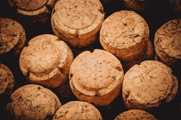 Texture background of champagne wine corks. Used wine corks alcohol background.