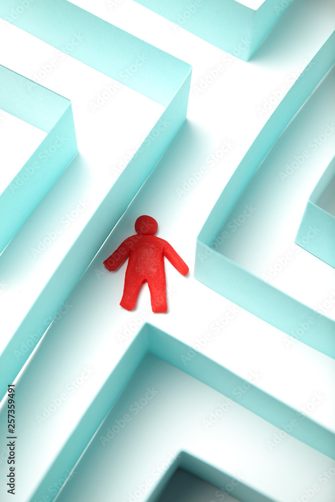 Poster the figure of the person is looking for a way out of the maze, a solution to the problem.
