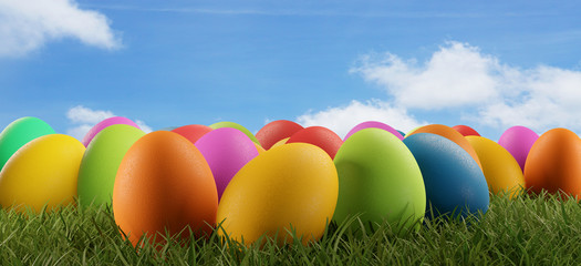 colorful Easter eggs green grass and sky 3d-illustration