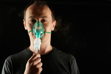 Young man using inhale