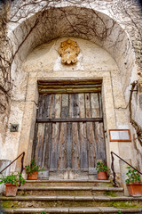 Fototapeta na wymiar Medieval entrance Villa Cimbrone by Ravello, Italy