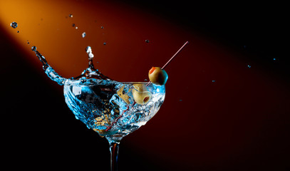 Dry martini with green olives.