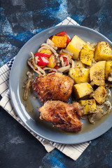 Roasted chicken thighs with potatoes