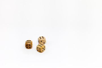 three wooden game dice on white background