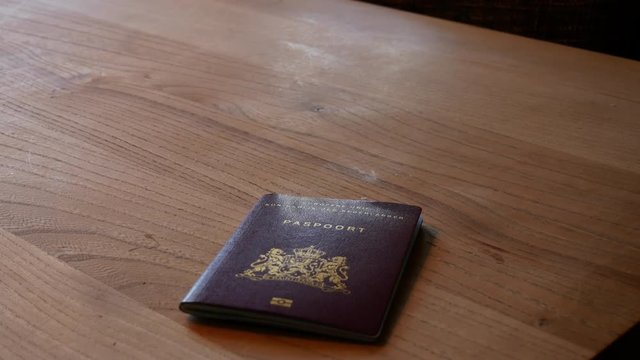 passport putting on table