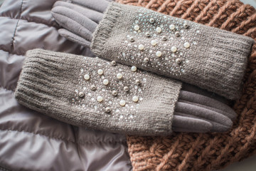 Knitted women gloves , warm cloth concept