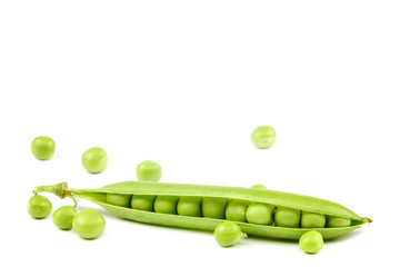 Fruits of green peas on white background.