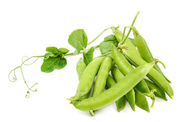 Fruits of green peas on white background.
